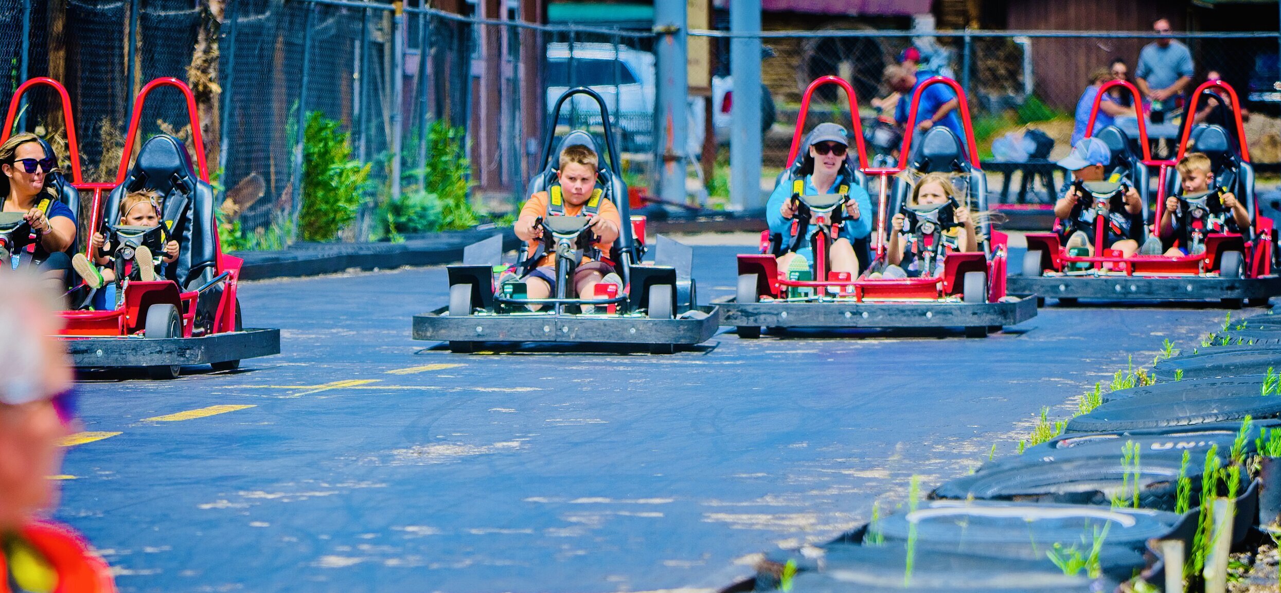 boy and people in go karts